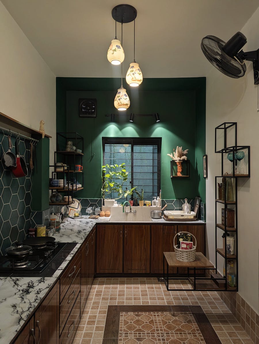 Marble and wood kitchen with artistic lighting