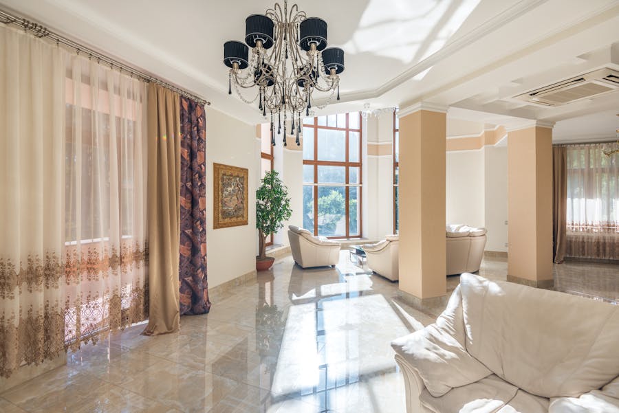 Grand living room with crystal chandelier and elegant seating